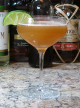 Barbados Rum Punch Cocktail with a lime segment garnish