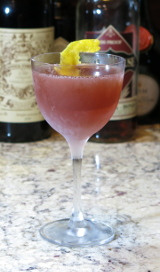 Bramble cocktail in a Nick & Nora glass