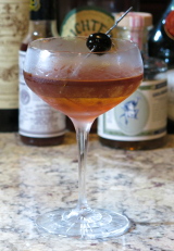 De La Louisiane Cocktail with a cherry garnish