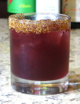 Mezcal Hibiscus Margarita on the rocks with Taijin rim