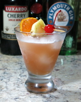 A Singapore Sling cocktail served up