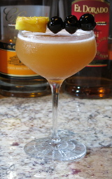 A Three Dots and a Dash Cocktail in a coupe glass